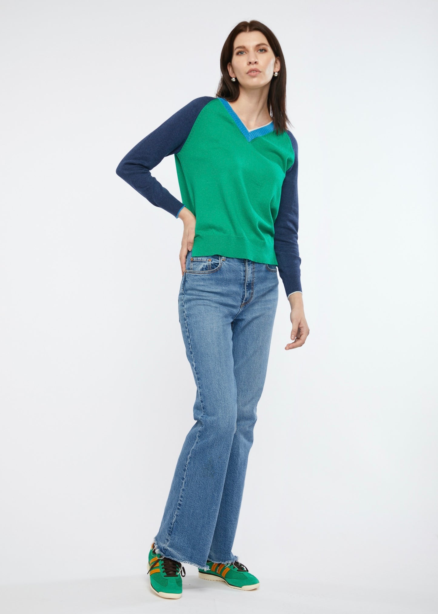 
                  
                    Fashioned V Neck jumper by Zaket and Plover in Emerald and Navy
                  
                