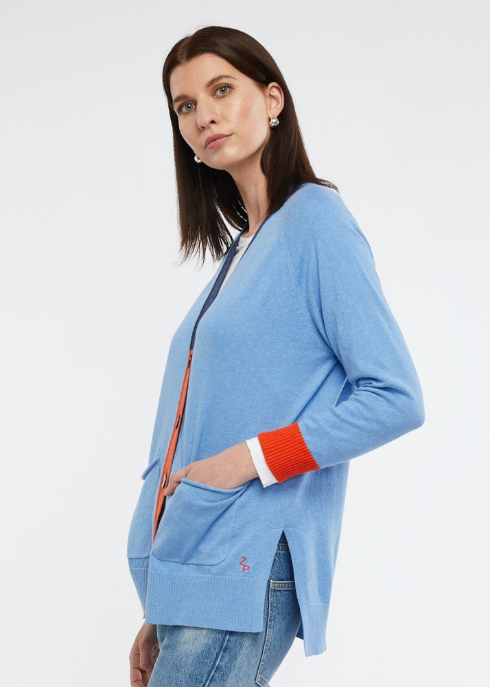 
                  
                    Light Blue Zaket & Plover Cashmere and Cotton Cardigan with dark blue and orange button details
                  
                